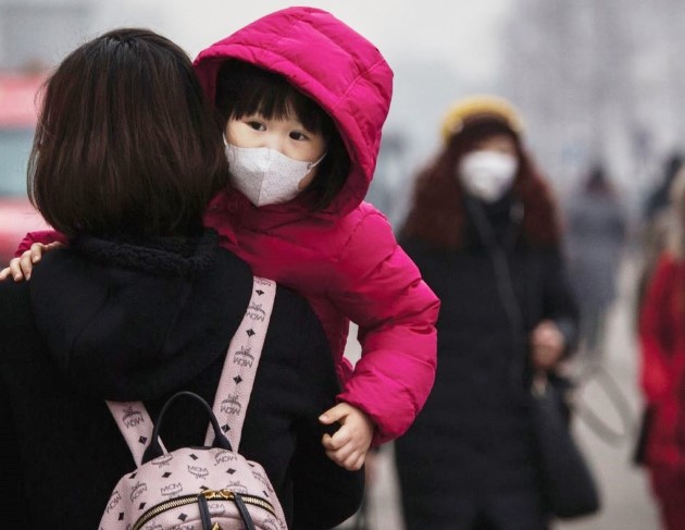 bambina maschera_inquinamento